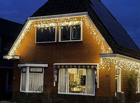 Luksus™ LED gordijn - ijspegel verlichting | 360 LED lampjes Extra warm wit / Amber | voor binnen en buiten | 10 + 10 meter snoer | 8 lichtstanden & timer functie
